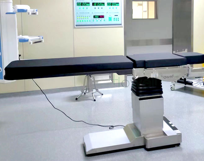 What benefits does the orthopedic operating bed made of full carbon offer?