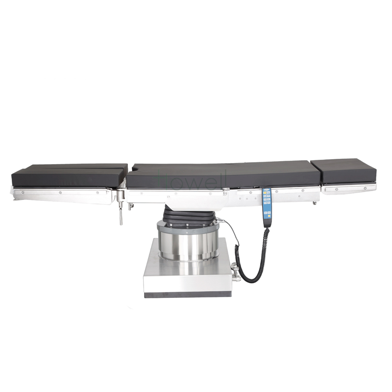What type of surgical navigation and positioning system is compatible with an operating bed?